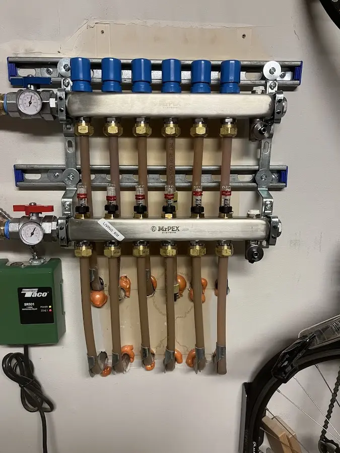 Plumber performing Water Heater Repair at a residential property in Asbury Lake